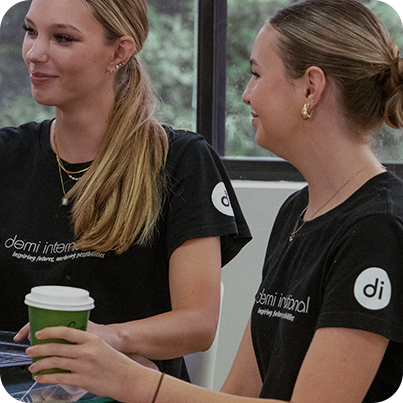 Two Demi International students sharing a coffee